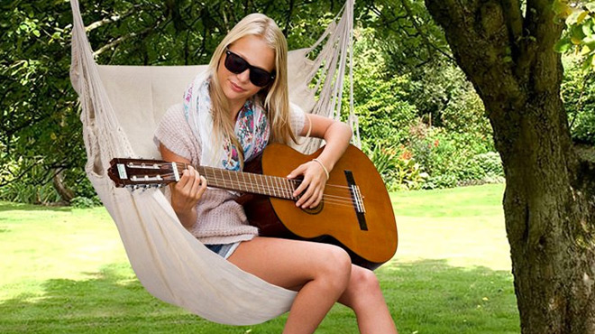 A Lady Playing Guitar and Resting on a Livhil Hammock Swing Chair