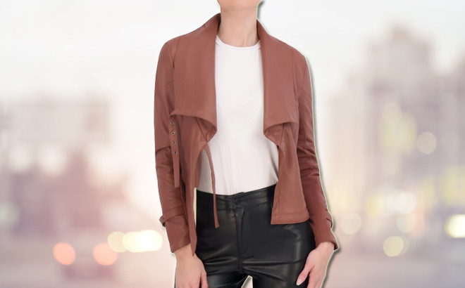 A Lady Wearing a Ookie Lalo Draped Faux Leather Moto Jacket in Luggage Color