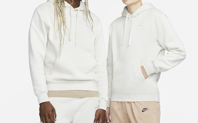 A Man and Woman Wearing Nike Sportswear Club Pullover Fleece Hoodie