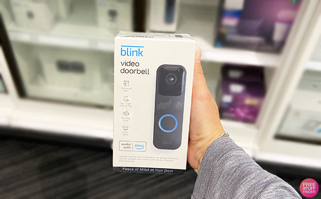A Person Holding Blink Video Doorbell