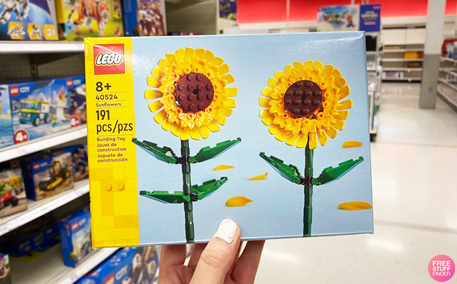 A Person Holding LEGO Sunflowers Building Toy Set Inside Target Store