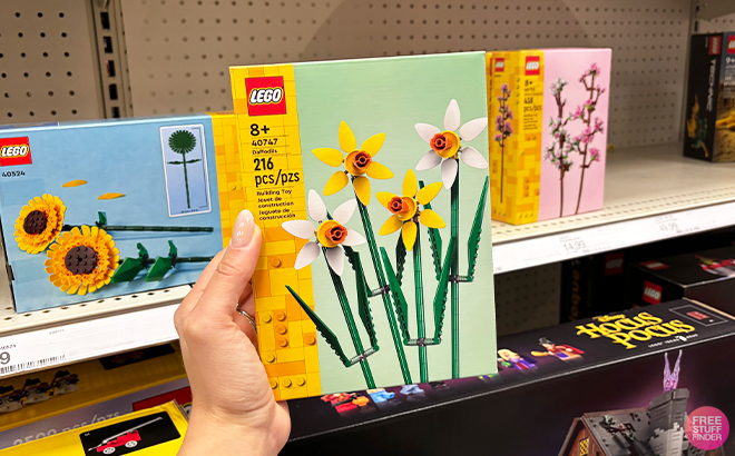 A Person Holding LEGO Yellow and White Daffodils Building Set at Target
