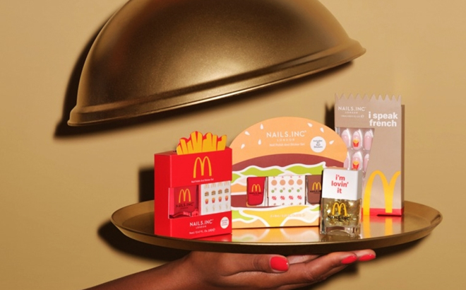 A Person Holding Nails Inc x Mcdonalds Nail Accessories Collection