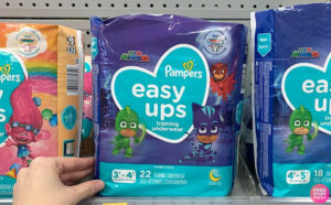 A Person Holding Pampers Easy Ups Training Underwear Boys Jumbo Size 3T 4T