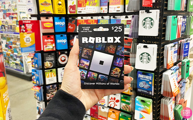 A Person Holding Roblox Gift Card