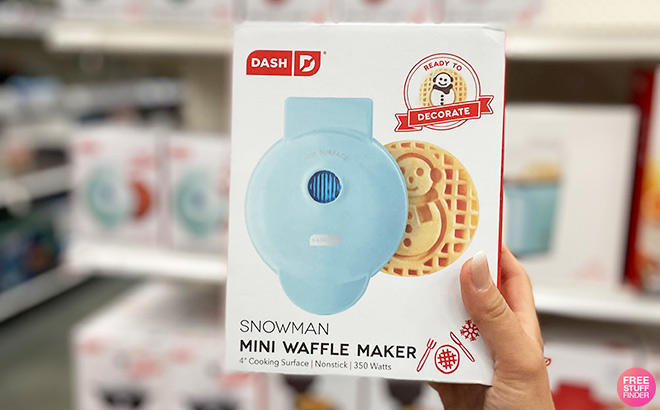 A Person Holding Snowman Mini Waffle Maker
