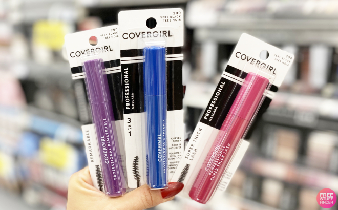 A Person Holding Three CoverGirl Professional Mascara
