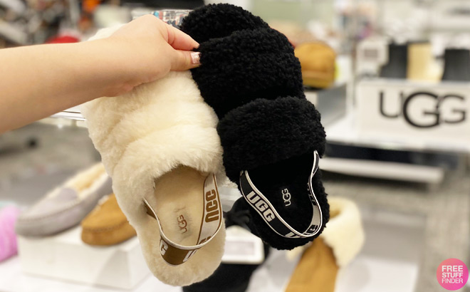 A Person Holding UGG Oh Fluffita Slippers