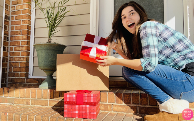A Person Holding a Gift Box at Front Door A Person Holding a Gift Box at Front Door