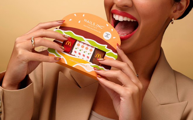 A Person Holding a Nails INC x McDonalds Mini Nail Polish Duo with Stickers