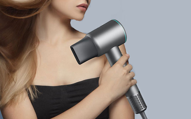 A Person Holding a Yinole Hair Dryer A Person Holding a Yinole Hair Dryer