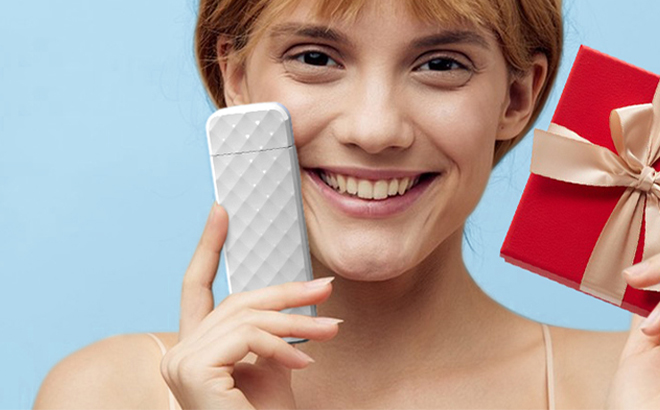 A Person Holding the USB Rechargeable Book Light in the Color White