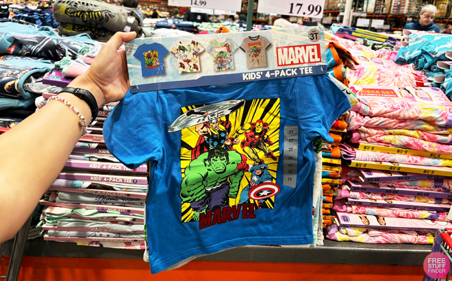 A Person Holing a Pack of 4 Marvel Kids Character Tees