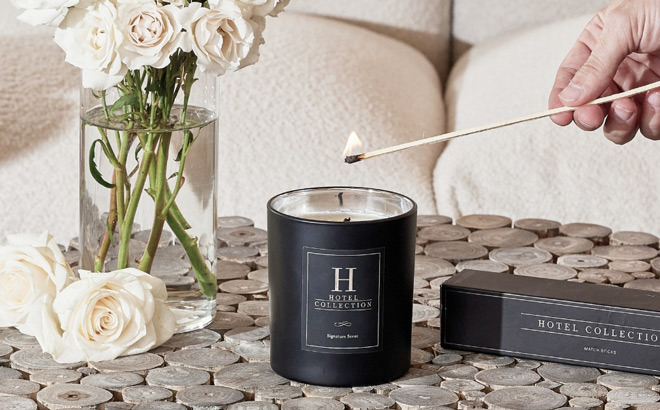 A Person Lighting a Hotel Collection Candle A Person Lighting a Hotel Collection Candle