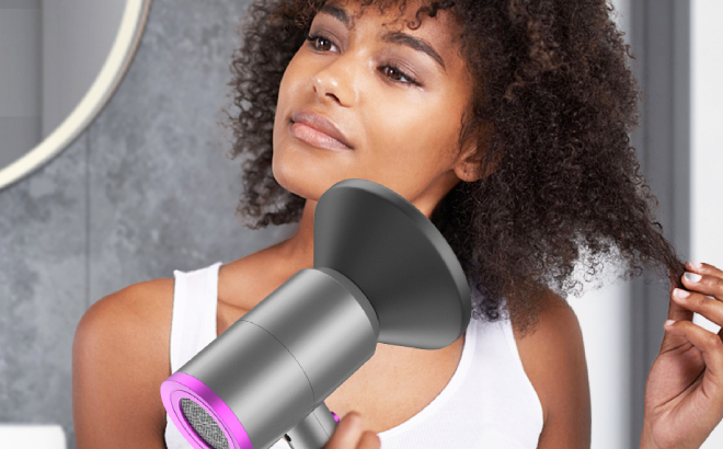 A Person Using Slopehill Professional Ionic Hair Dryer