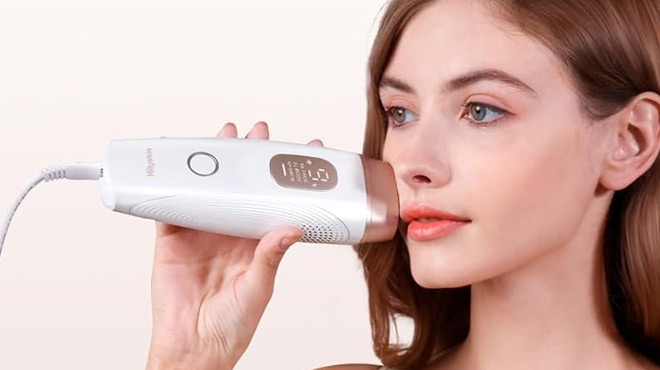 A Person Using a Hikyskin Laser IPL Hair Remover