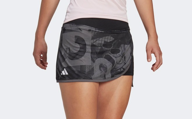 A Person Wearing Adidas Womens Tennis Graphic Skirt