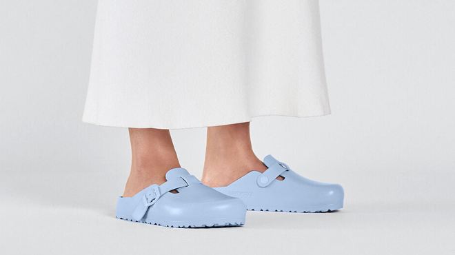 A Person Wearing Birkenstock Boston EVA Sandals A Person Wearing Birkenstock Boston EVA Sandals