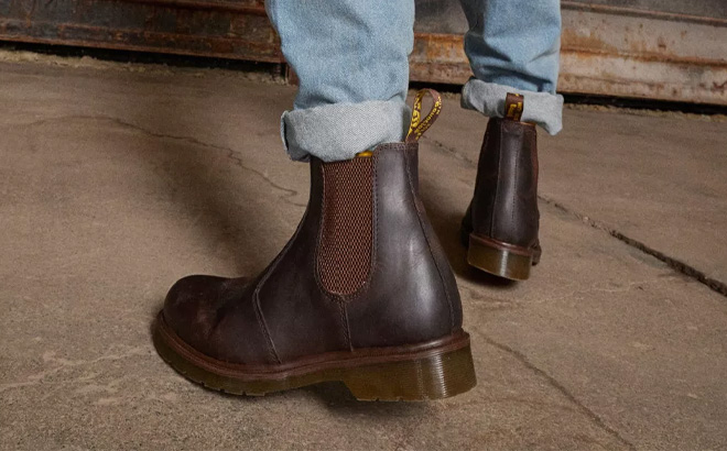 A Person Wearing Dr Martens Crazy Horse Leather Chelsea Boots