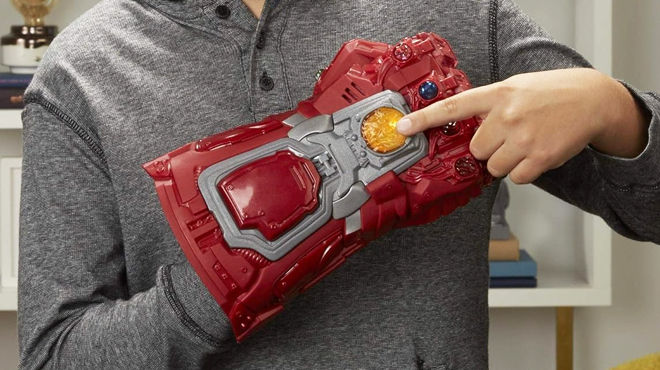 A Person Wearing Marvel Avengers Gauntlet Toy