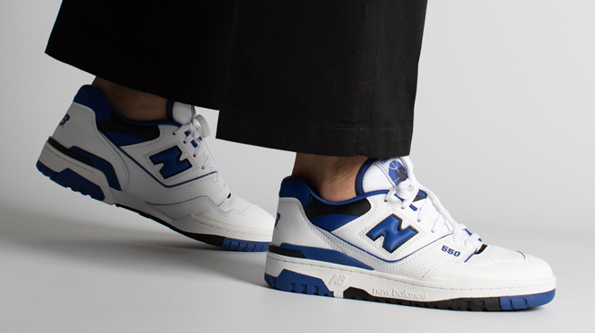 A Person Wearing New Balance 550 Shoes