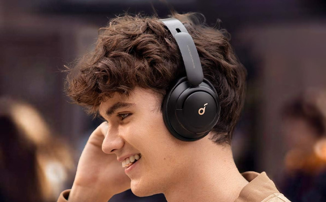 A Person Wearing Soundcore by Anker Life Q30 Hybrid Active Noise Cancelling Headphones