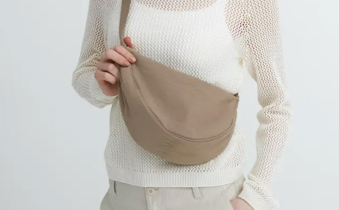 A Person Wearing a Beige Belt Bag You Can Get For Free with TCB