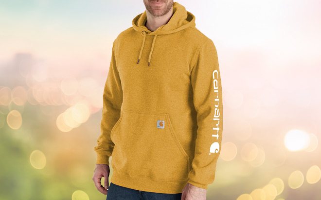 A Person Wearing a Carhartt Mens Hoodie in Honey Comb Color