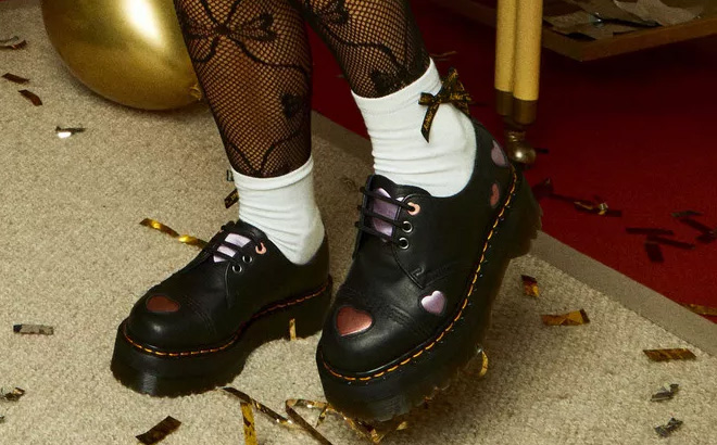 A Person is Wearing Dr Martens 1461 Leather Heart Platform Shoes