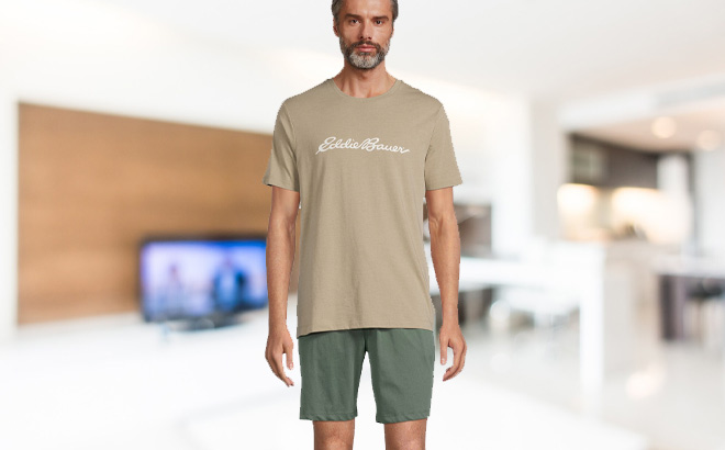 A Person is Wearing Eddie Bauer Mens Graphic Tee and Shorts Sleep Set in Agave Color