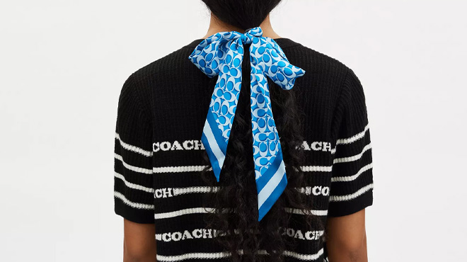 A Woman Wearing Coach Outlet Signature Print Silk Skinny Scarf