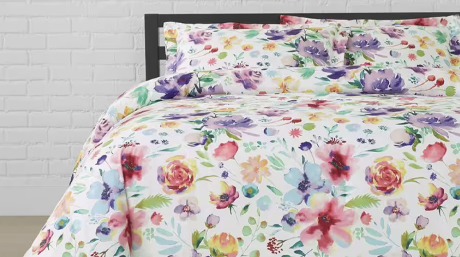 A photo of StyleWell Emme 3 Piece Multi Color Bright Floral Comforter Set