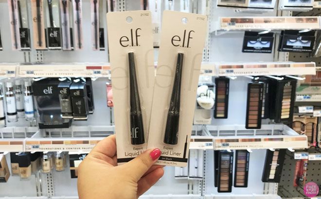 A Person Holding Two e.l.f Liquid Liners inside a Store