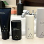 Four Agency Skincare Products in a Bathroom