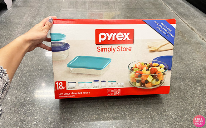 Hand Holding Pyrex Storage Set
