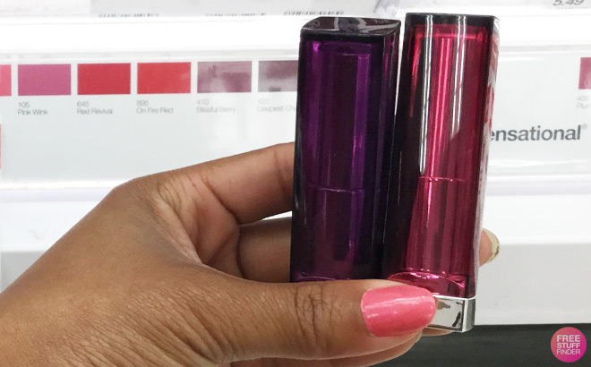 Hand Holding Two Maybelline Color Sensational Lipstick