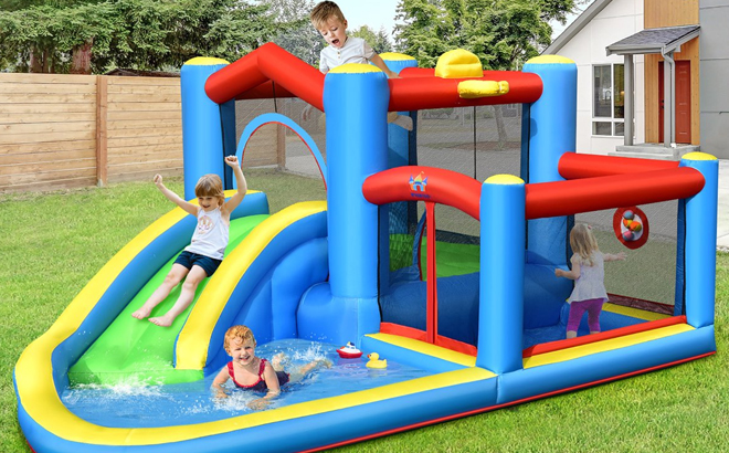 Kids Playing on the Costway Inflatable Water Slide Bounce Castle