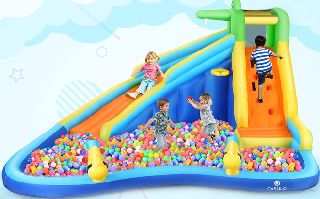 Kids Playing on the Qhomic Inflatable Water Slide Transformed Into Ball Pit Play Center