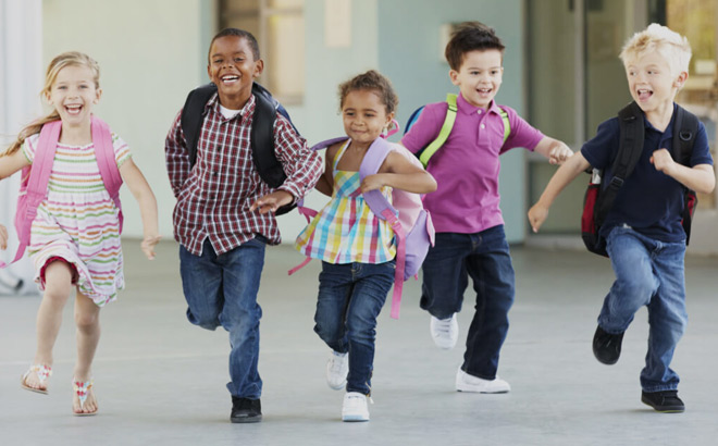 Kids with Backpacks Running and Smiling