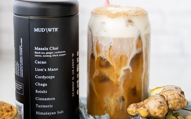 MUDWTR Mushroom Based Coffee Alternative in a Tin Next to a Drink in a Glass