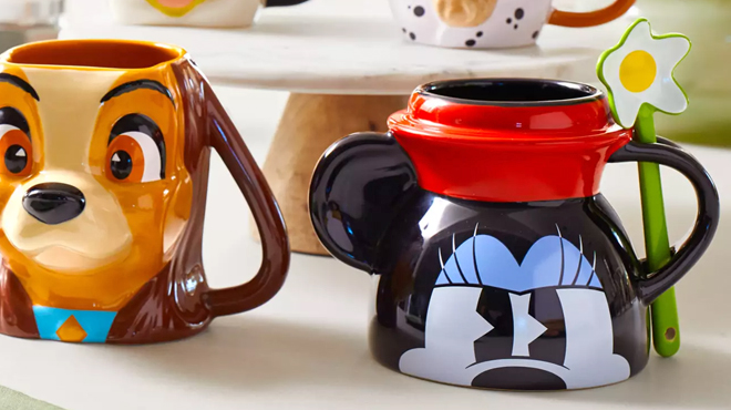 Minnie Mouse Mug with Spoon on a Table