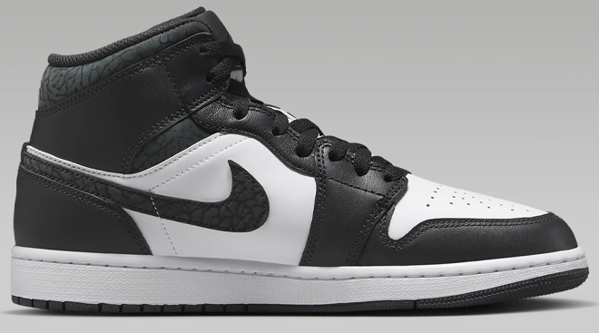 Nike Air Jordan 1 Mid SE Mens Shoes in Black and White on a Gray Background