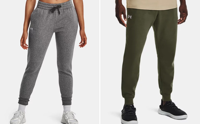 Persons Wearing Under Armour Womens UA Rival Fleece Joggers on the left and Under Armour Mens UA Rival Fleece Joggers on the right