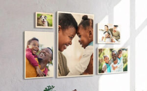 Photo Prints of a Family Hung on a Wall
