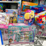 Shopping Cart filled with Toys inside a Store