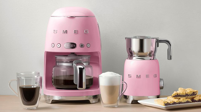 Smeg 50s Retro Pink Drip Coffee Machine on a Table