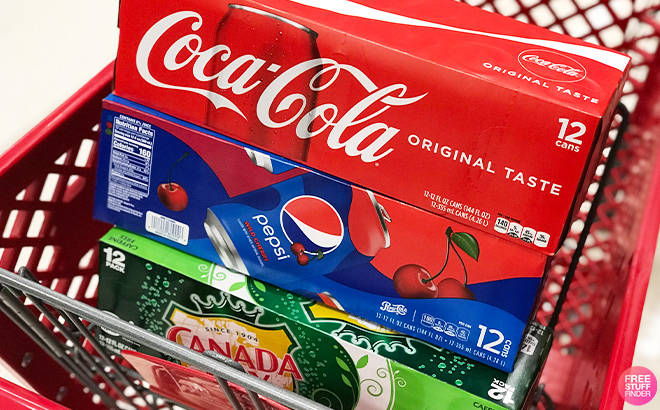 Soda Coca Cola Pepsi and Canada Dry Packs in the Cart