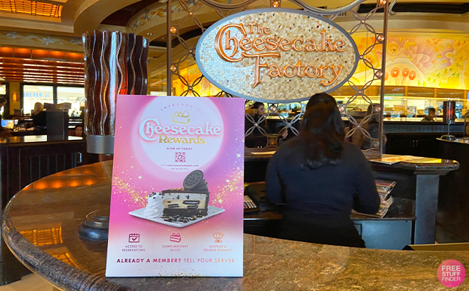 The Cheesecake Factory Restaurant Reception and a Cheesecake Rewards Sign on the Counter