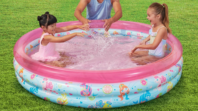 Two Girls Playing in the Unbrand Round Inflatable Kiddie Splash Play Pool