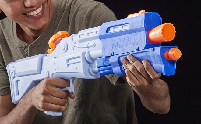 a Kid Holding NERF Fortnite Super Soaker Water Blaster Toy